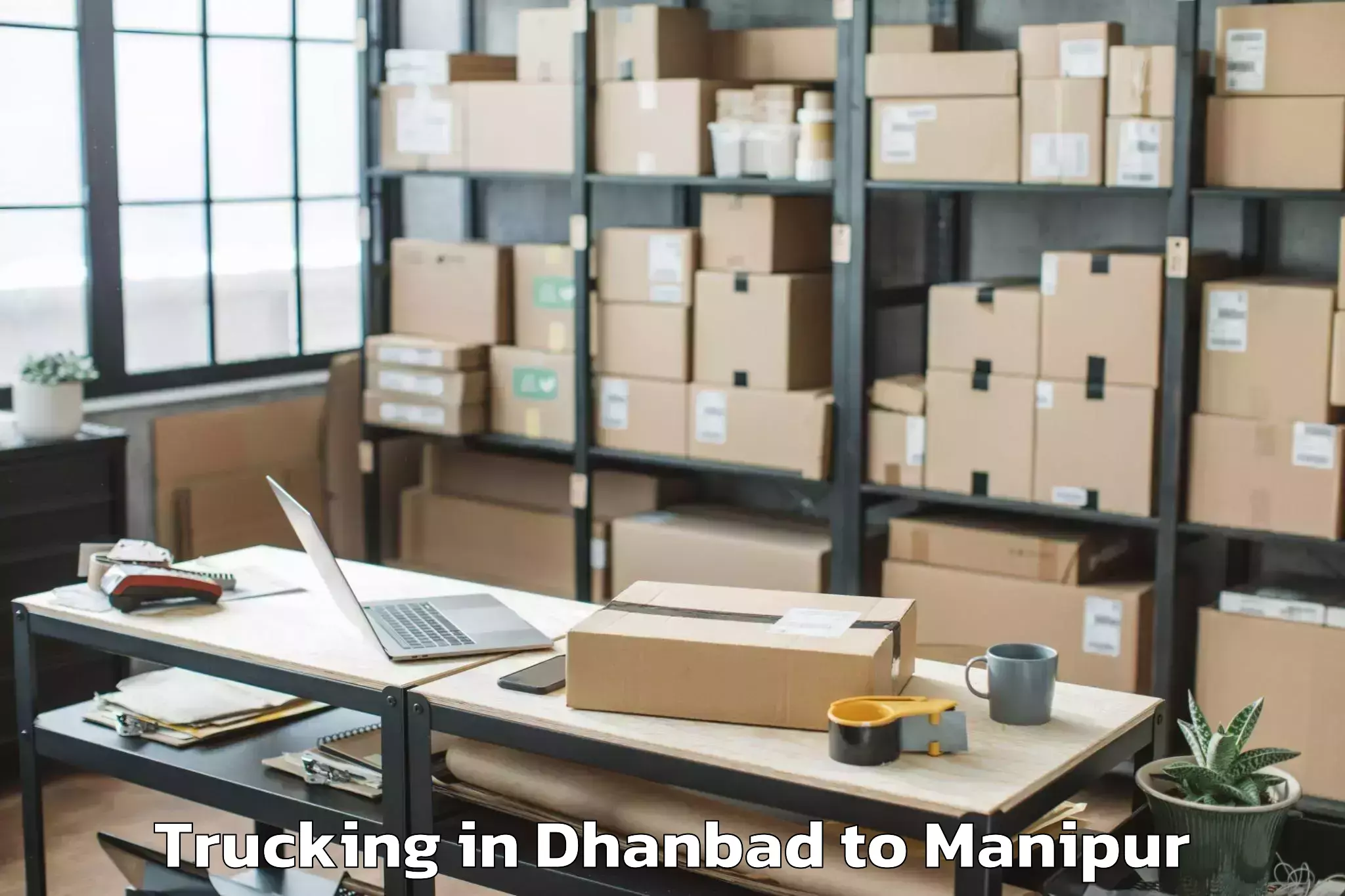 Leading Dhanbad to Keirao Bitra Trucking Provider